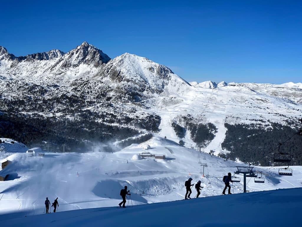 Silhouettes of skiers in Andorra