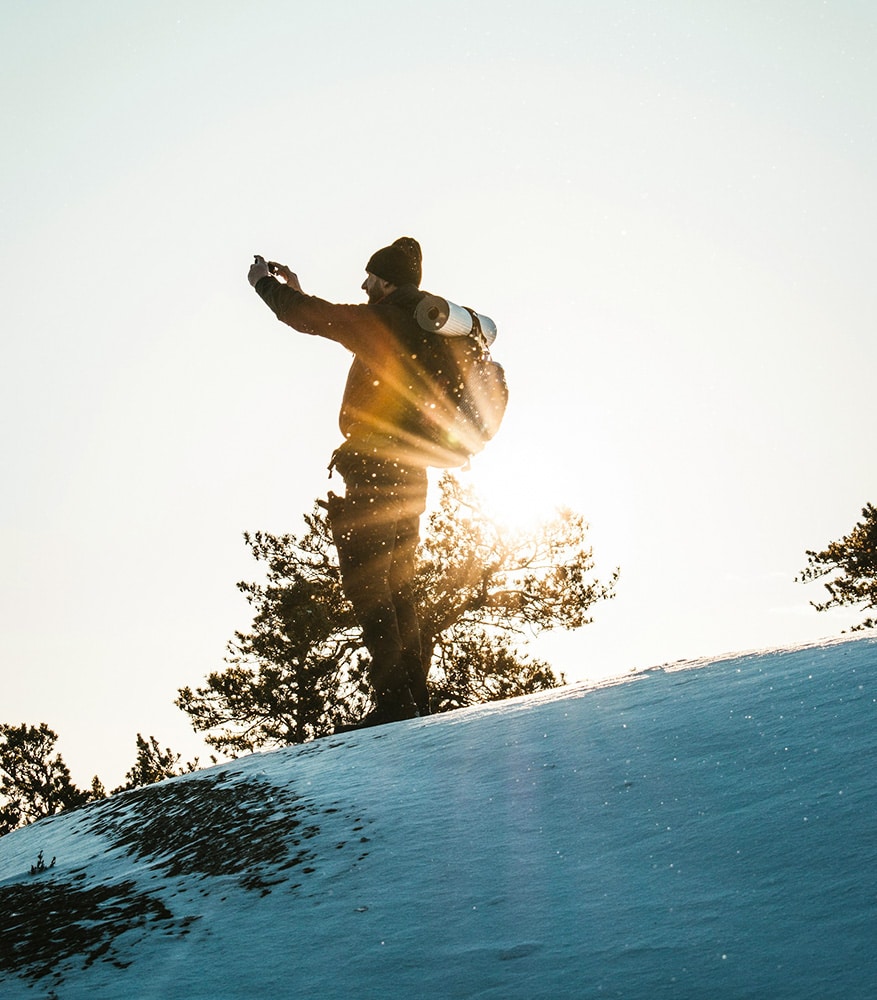 A hiker looking for network